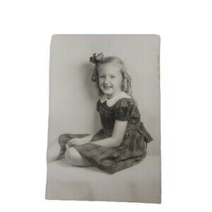 Vintage Photo Young Blonde Girl Curls Bow Ribbon in Hair Smiling Plaid Dress B&W